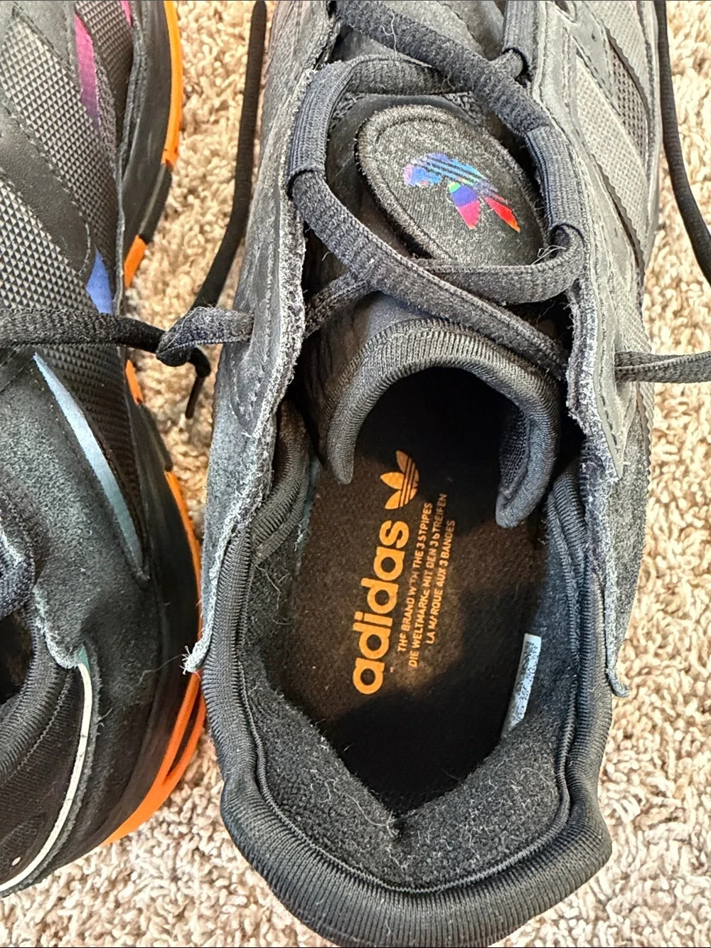 adidas MENS Black Sneakers with Pink and Orange Gradient Accents